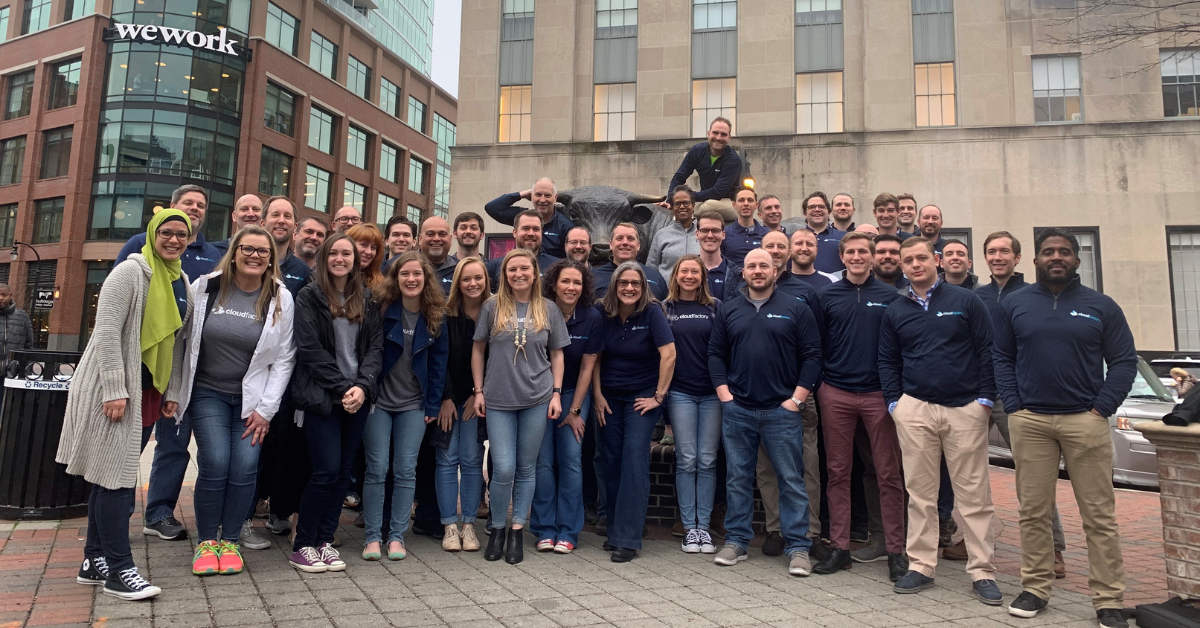 A group photo of some of the CloudFactory USA team in downtown Durham, NC.