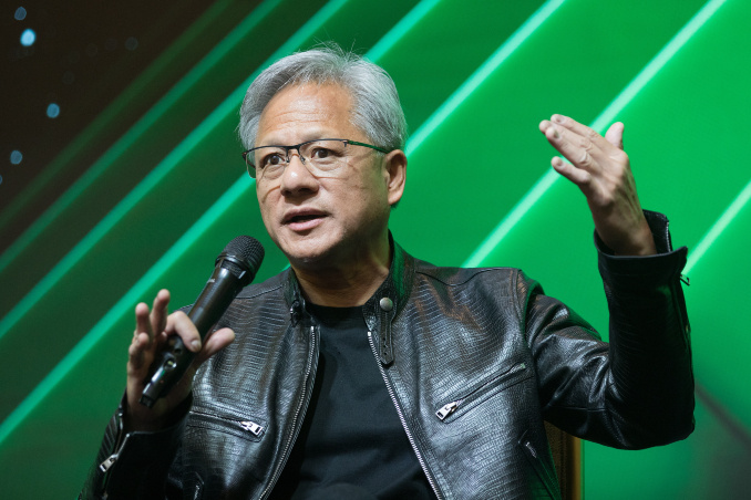 Jensen Huang speaks at a conference.